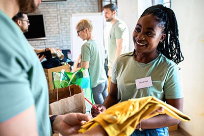 Woman volunteering at a charitable organization. 