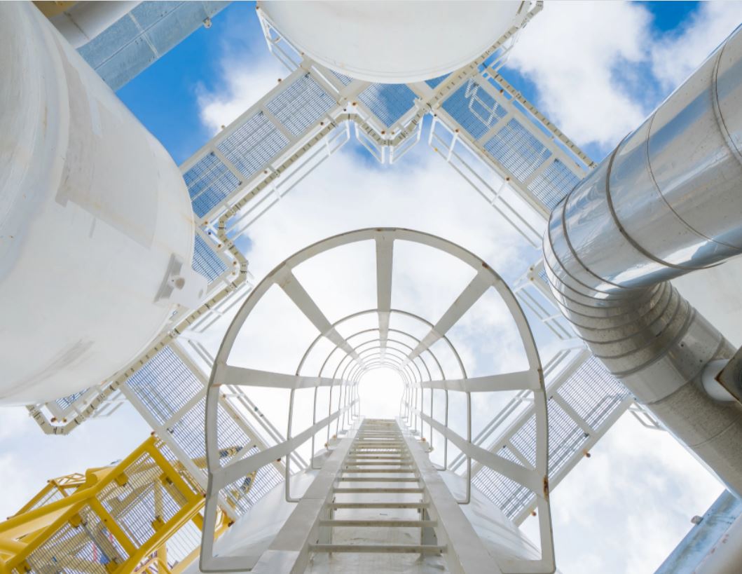 Image shows plant infrastructure, pipes and steps leading to chemical production platforms